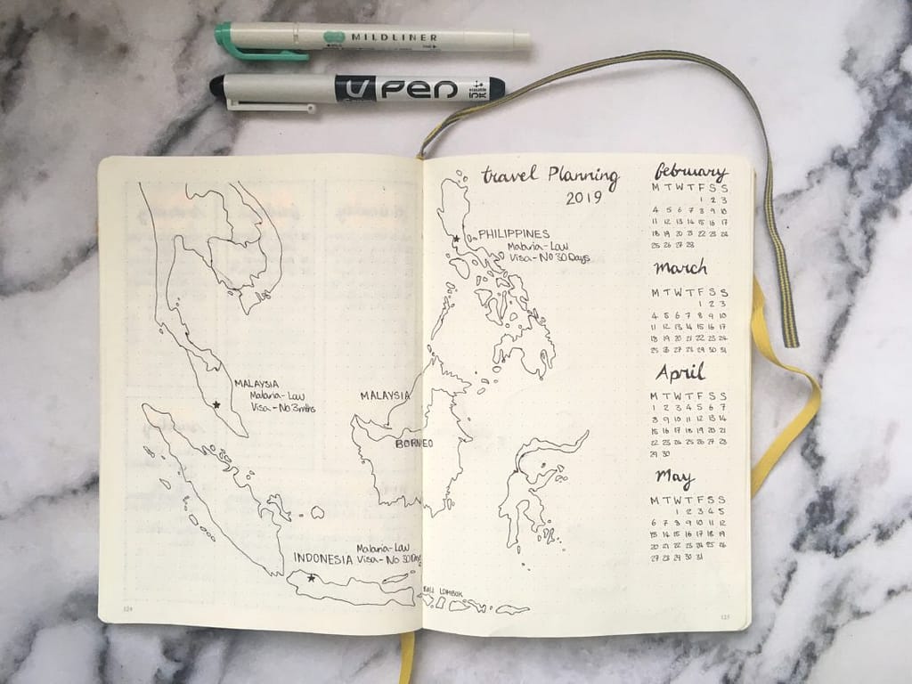 bullet journal travel map spread yellow feather blog